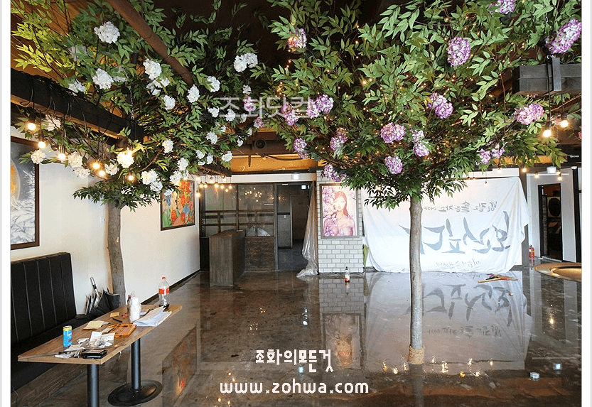 인천 계산점 지금보고싶다 — 꽃나무 테마로 연출한 매장 전경