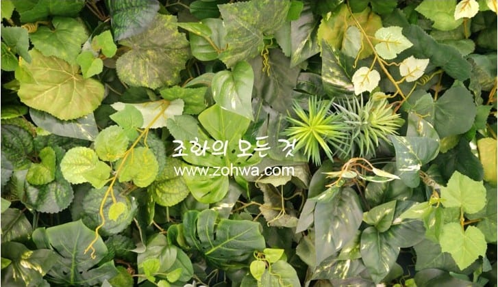 삼성동 네이처컬렉션 — 여러 종류의 잎이 섞인 벽면 디테일
